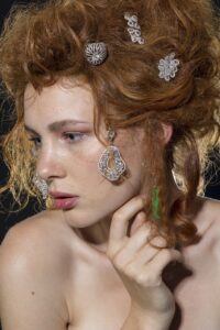 model, gift of jewelry, woman, beautiful, earring, girl, lips, nose, view, studio, red, hair, make-up, fashion, youth, diamond